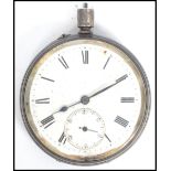 A gents silver hallmarked enamel faced pocket watch, Roman numeral chapter ring with subsidiary