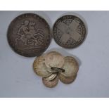 A group of pre decimal silver coins to include an 1820 Georgian crown, a one florin, and various