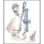 A Lladro ceramic figurine group entitled ' Summer on the Farm  ' depicting a girl with bow to hair