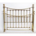 A contemporary John Lewis double bed brass form in the Victorian style with brass spherical