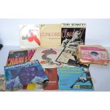 A collection of vintage 78rpm shellac and long play vinyl records predominately jazz records by