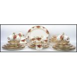 A 20th century Royal Albert old country roses tea and dinner service to include 8 dinner plates, 1