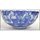 A late 19th / early 20th century Oriental blue and white ceramic bowl of scalloped form having a