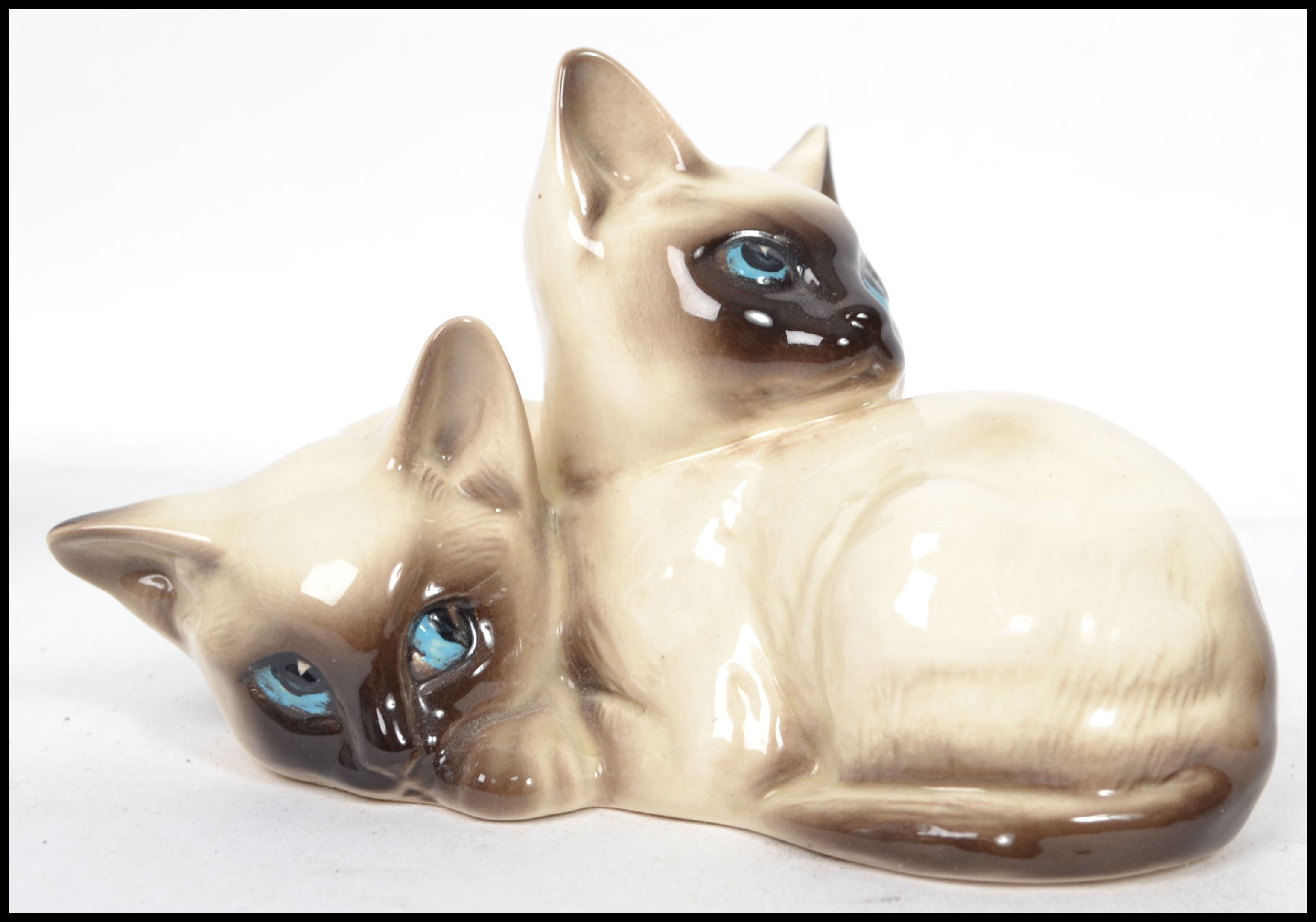 A group of vintage ceramic cats to include a Royal Doulton 1296 a Beswick 1887 and a Beswick 1559. - Image 2 of 7