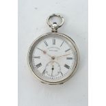 A vintage silver open faced pocket watch, the dial marked for HE Peck, London. Enamel face with