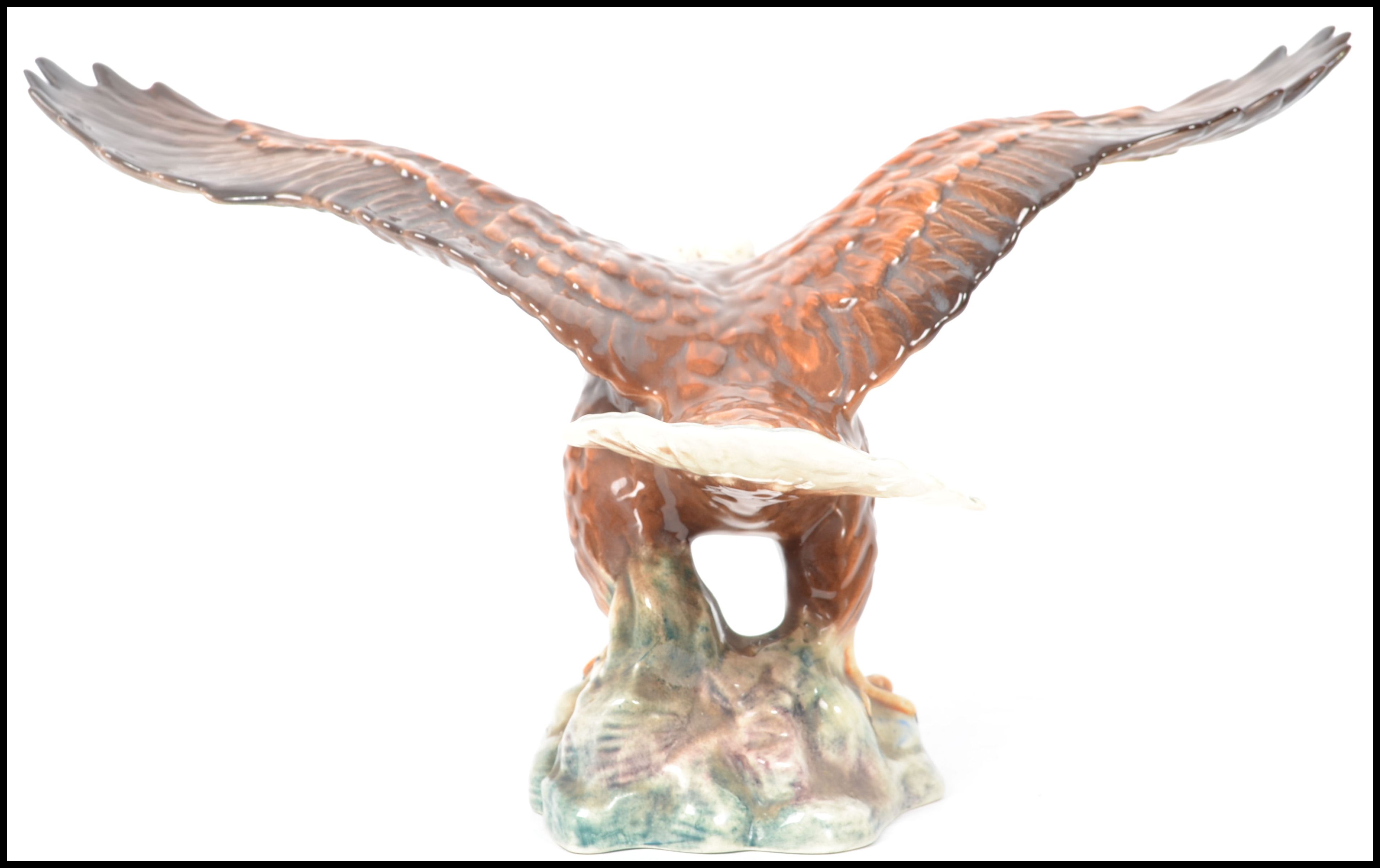 A Beswick - large early bird figure ' Bald Eagle ' Model 1018, of an eagle with it's wings at full - Image 3 of 5