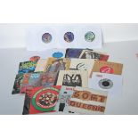 A collection of vinyl 7" 45rpm vinyl record singles dating from the 80's and 90,s featuring