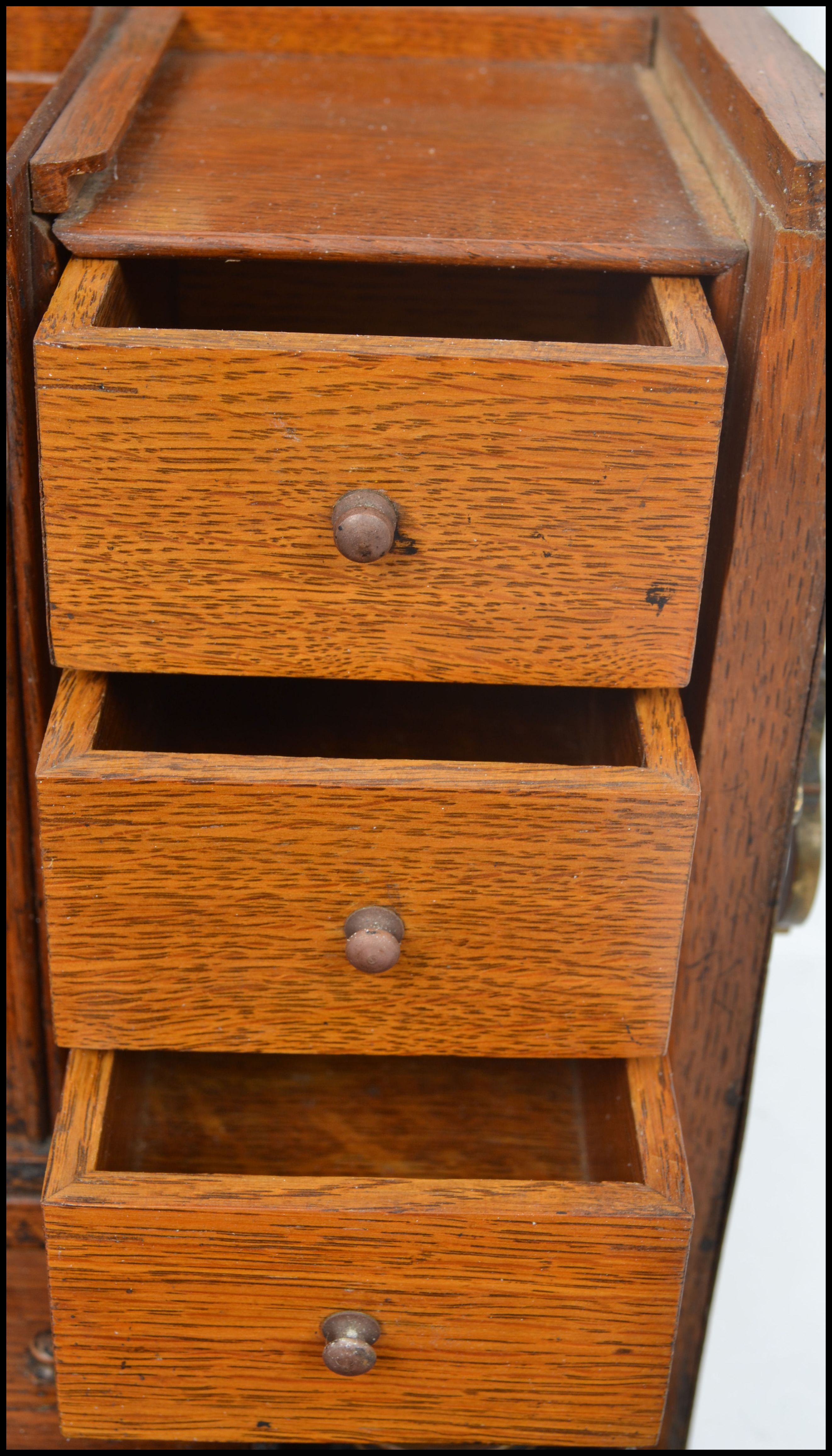 A very good early 20th century  Edwardian oak metamorphic desk tidy / stationery box. Pull action - Image 5 of 8