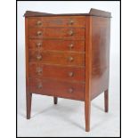 An Edwardian mahogany Industrial  pedestal office filing cabinet. Raised on tapering legs with a