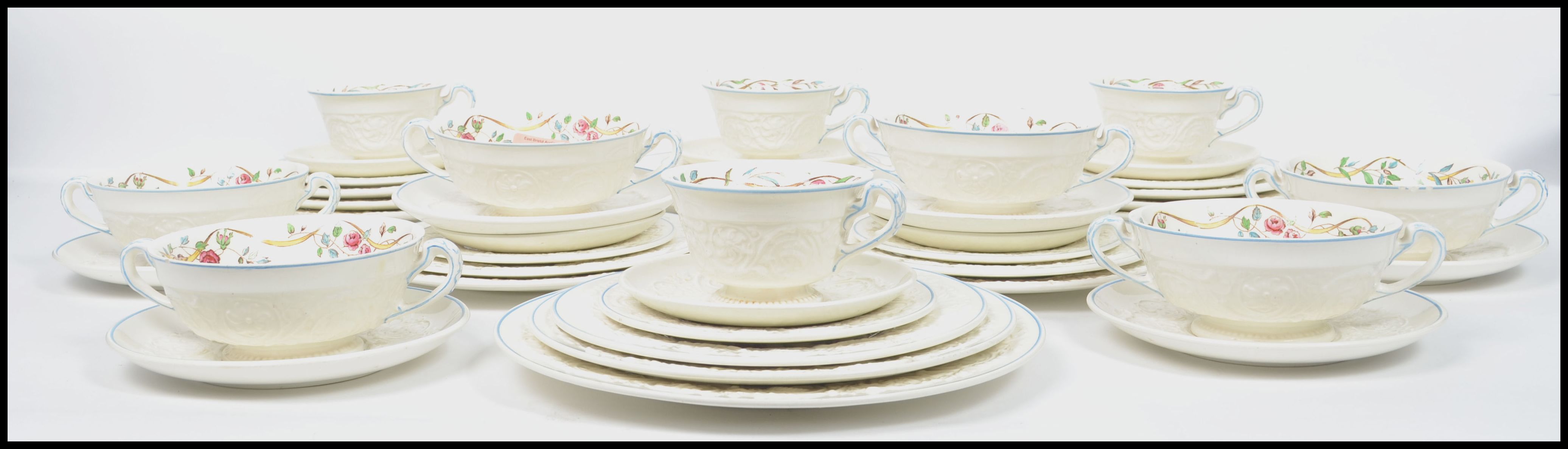 An extensive Wedgwood Patrician ' Argyle ' pattern to consist of plates of various sizes, soup