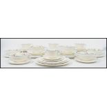 An extensive Wedgwood Patrician ' Argyle ' pattern to consist of plates of various sizes, soup