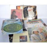 A collection of vinyl long play record albums to include several Rod McKuen, Cliff Richard, Precious