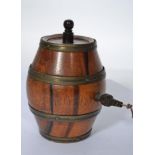 A vintage 20th century plum line in the form of a Coopered barrel having tap to front with winder to