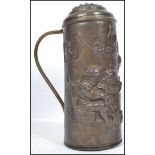 A 19th century lidded copper tankard having a shaped handle, the body depicting a Dutch master