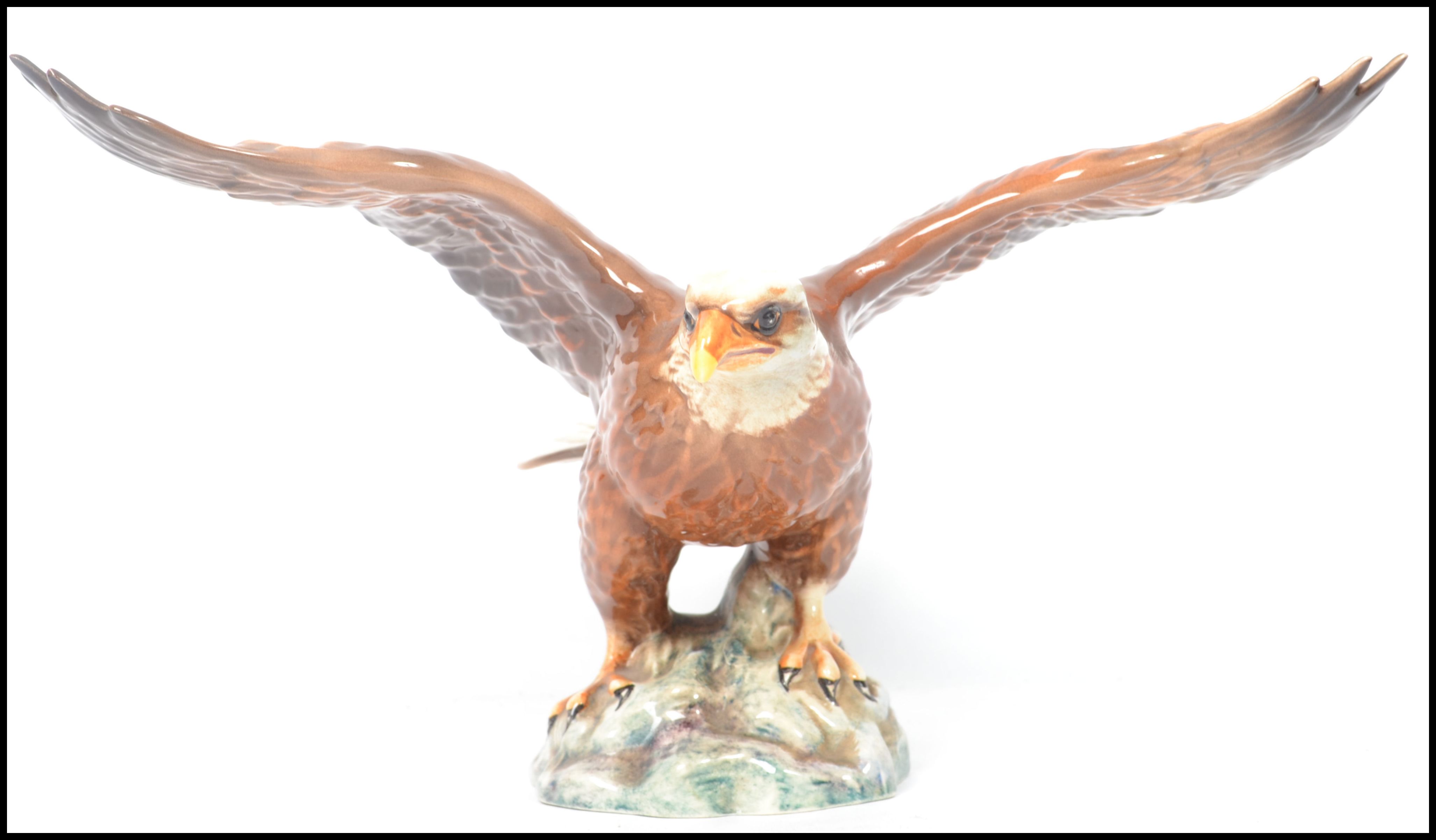 A Beswick - large early bird figure ' Bald Eagle ' Model 1018, of an eagle with it's wings at full