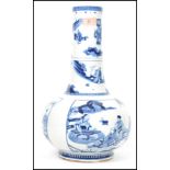 A large Chinese 19th century Kang-xi  long neck vase of bulbous form having raised foot.  This