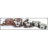 A collection of 5 vintage 20th century SLR camera's to include Beirette & Beirette K, Retnette IA,