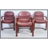A set of four 1970's Danish inspired red leather c