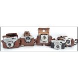 A collection of 5 vintage German Camera's to include Halina SUper, Paxina Super ( Braun )