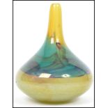 A 20th century retro Mdina studio art glass vase of baluster form having a bulbous body with waisted