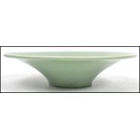 A Chinese /  Oriental ceramic celadon crackle glaze bowl of large tapering form. Measurements: 9