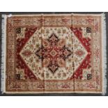 A large Iranian / Persian Keshan carpet - rug having beige  ground with geometric decoration and