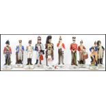 A collection of ten various Napoleonic style ceramic soldiers, each in full uniform and on a