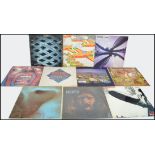 A collection of vinyl long play LP records to include Rod Stewart / Faces, The Who, Pink Floyd,