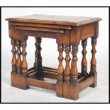A good ipswich oak peg jointed nest of tables. The turned legs united by stretchers, of heavy set
