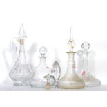A group of early 20th century cut class decanters and claret jugs to include captains ship