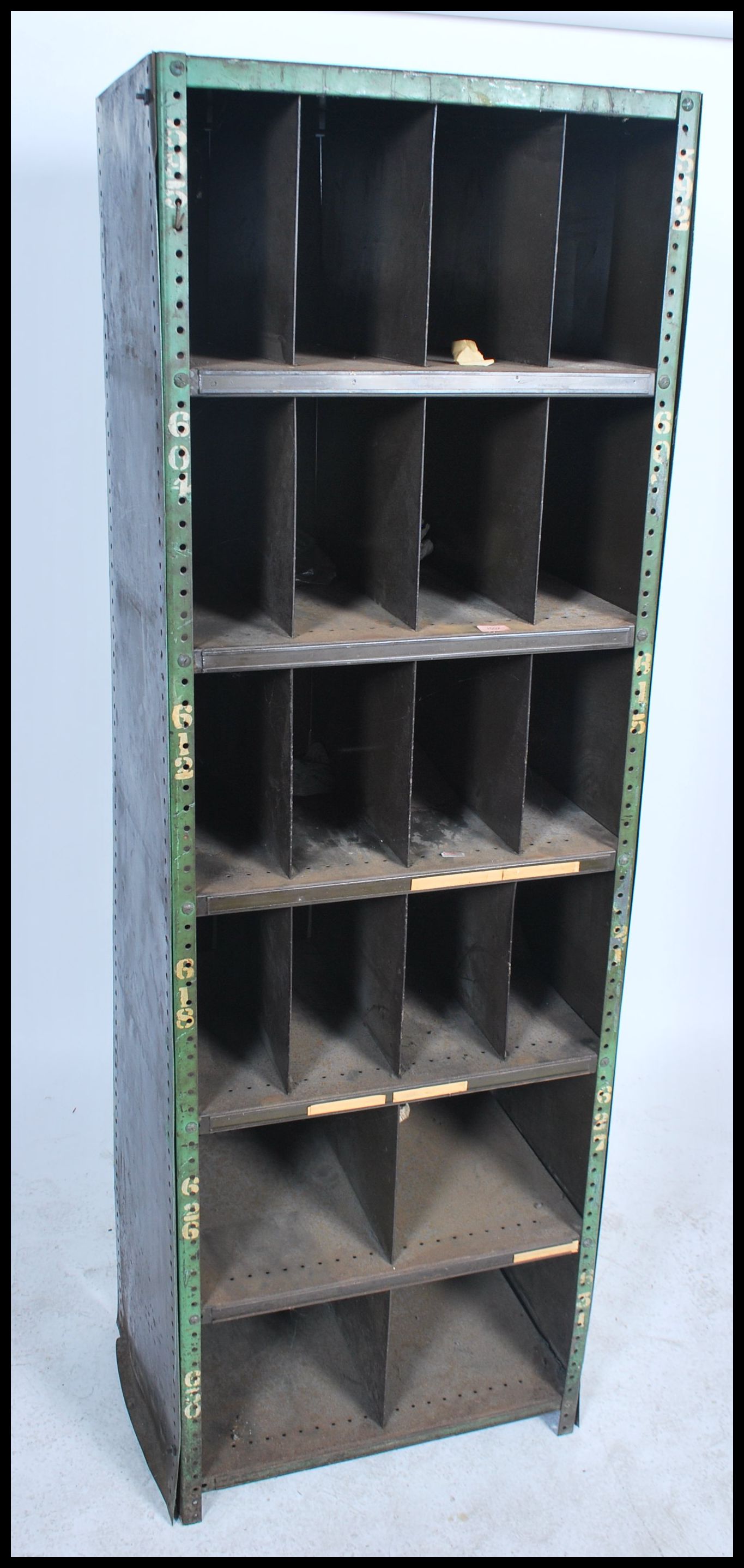 A slim original mid 20th century Industrial large green enamel metal sectional cubby cabinet. The - Image 2 of 4