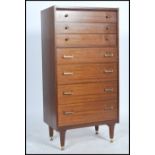 A 1960's Ernest Gomme ( early G-Plan ) tola teak wood seminaire upright pedestal chest of drawers.