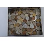 A collection of 20th century and other world coins and tokens to include motoring, European etc.