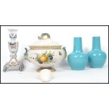 A collection of ceramics to include a pair of monochrome Celadon Chinese vases, a faience, candle