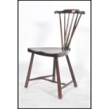 A 19th century possible spindle back Goldsmith type windsor nursing chair having an elm saddle