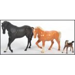 A group of three Beswick ceramic pony / horse figures to include a Matt Black Beswick horse, a