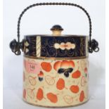 A 19th century English Factory ceramic biscuit barrel having a painted Imari pattern with cobalt and