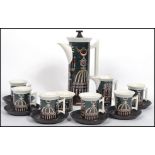 A vintage mid century Portmeirion coffee service in the ' Magic City ' pattern comprising of