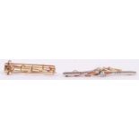 Two Edwardian ladies bar brooches comprising a platinum and 9ct gold old cut diamond brooch and a