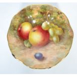 A 20th century Royal Worcester bone China scalloped raised dish painted with apples and grapes