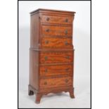 A Regency revival mahogany straight front six drawer tall boy chest of drawers, drop handles