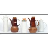 A collection of 5 vintage / retro coffee / teapots of varying shapes and sizes. Highest measures