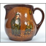 A Royal Doulton Kingsware Jug, "THE ARTFUL DODGER MEETS OLIVER TWIST" showing the Artful Dodger