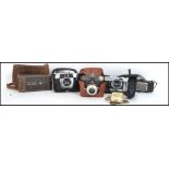 A collection of 5 vintage cameras to include AGFA Clack, AGFA Isoly AGFA Karat and an AGFA folding