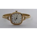 A sterling silver Tissot Le Logle ladies dress watch having a silver 925 rigid bracelet with