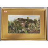 English School Naive oil on board painting of a garden house / shed in floral gardens, signed to the