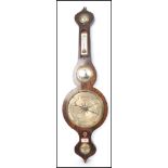 A 19th century Georgian banjo barometer having silvered dial with thermometer having mercury back