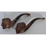 Two early 20th century briar wood pipes having ebo