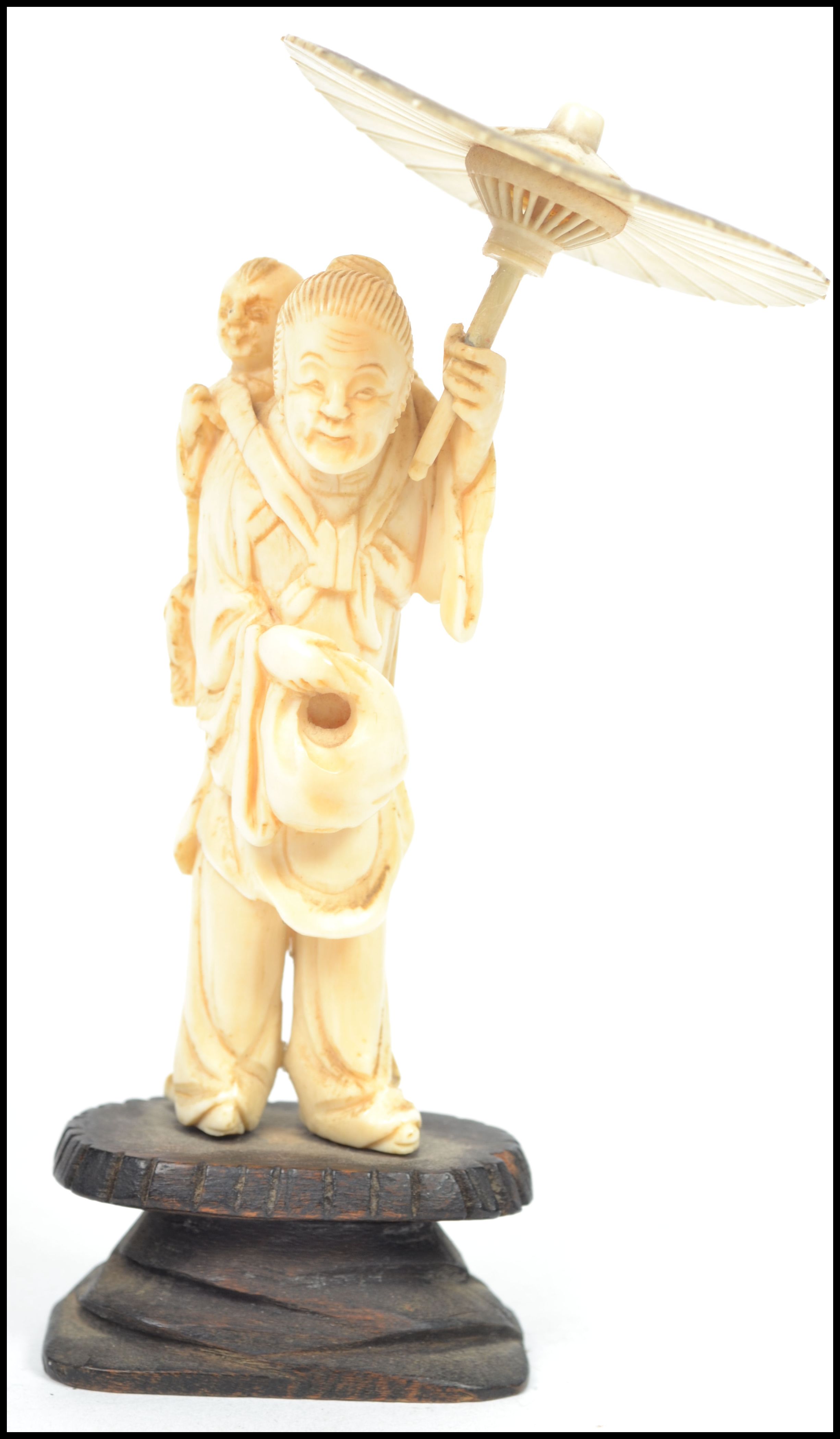 A 19th century Japanese Okimono ivory figurine of