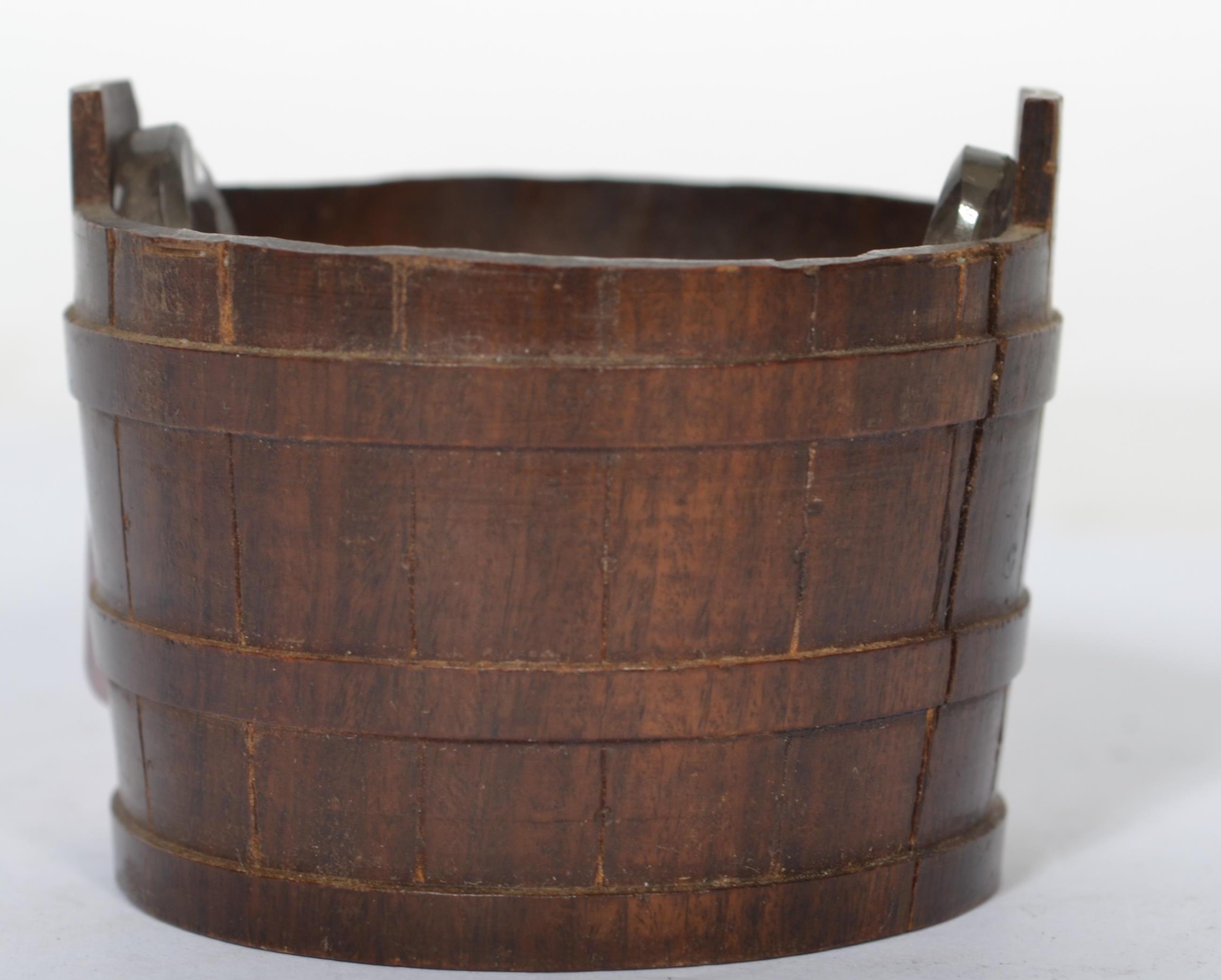 A 19th century treen salt condiment in the form of
